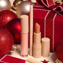 Load image into Gallery viewer, The secret ingredient in our Warm Wishes Lip Trio is Spice Cocoa, Ginger, and Caramel Brûlée👩🍳 🥧 🤎"Ginger Lipstick" - a nude brown lipstick with a light caramel undertone ✨Pigmented matte formula ✨Smooth easy application ✨Long Lasting. The best price, deal and quality w/ Bonitawholesale.com