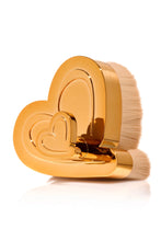 Load image into Gallery viewer, This Body Glow Blending Brush is adorably heart shaped, with dense soft bristles to buff and blend into every contour of your body. Use with Beauty Creations Body Glow oils. Add product to the desired area and blend into the collarbones, shoulders, arms and legs, for stunning shimmer sheen. Cruelty-free and Vegan. The best price, deal and quality w/ Bonitawholesale.com