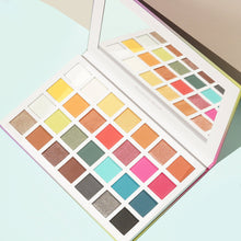 Cargar imagen en el visor de la galería, Vacation Mood is your perfect palette to pack up with you on any trip. This twenty-eight shaded palette has three different finishes to pigmented mattes, velvet-shimmers, and shimmers. Shades range from your blendable neutrals to our exotic electric shades. The best price and deal w/ Bonitawholesale.com