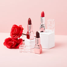 Load image into Gallery viewer, Dress your lips in highly-pigmented richness with Romantic Beauty's lightly-scented Glass Lipper matte-finish formula. Its long-lasting effect never dries the lips and instead provides you with a smooth, transfer-proof kissable pout. Available in six radiant shades, there's Glass Lipper for every mood you're in. Color : L. Peach, L. Rose, Shiam Ruby, Fire Opal, Garnet and Burgundy. The best price and deal w/ Bonitawholesale.com
