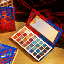 Load image into Gallery viewer, The Fire Bird palette consists of 32 pressed pigments that will give you bright and bold looks only worthy of a fierce queen. Be reborn with all the variations of shimmer, glitter, and matte with high-quality payoff.. The best price and deal w/ Bonitawholesale.com
