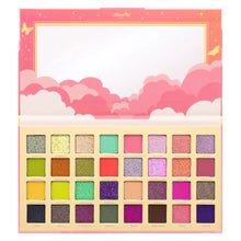 Load image into Gallery viewer, The Enchanted Sky palette consists of 32 pressed pigments designed with the smoothest of texture and pigments for looks out of this world. Levitate with the help of rich mattes, silky shimmers and flirty glitters. The best price and deal w/ Bonitawholesale.com