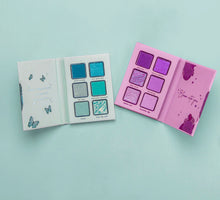 Cargar imagen en el visor de la galería, Spread your wings & bloom into you! Discover & embrace a vibrant attitude with this two piece snap-together palette filled with electrifying blues & dreamy purples. Effortlessly blend creamy mattes & add the perfect finishing touch with brilliant metallics. Perfect for mixing & matching, let your creativity shine! The best price and deal w/ Bonitawholesale.com