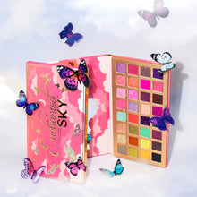Load image into Gallery viewer, The Enchanted Sky palette consists of 32 pressed pigments designed with the smoothest of texture and pigments for looks out of this world. Levitate with the help of rich mattes, silky shimmers and flirty glitters. The best price and deal w/  Bonitawholesale.com
