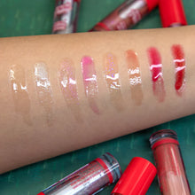 Load image into Gallery viewer, Our bestselling lip gloss now comes in a juicy plumping formula! Hyaluronic acid, shea butter, and vitamin e keep your lips soft and supple while chili extract immediately plumps your pout. The best price, deal and quality w/ Bonitawholesale.com
