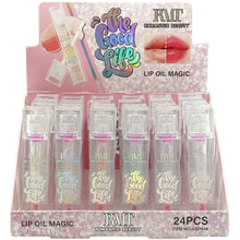 Load image into Gallery viewer, Experience the magic of our Romantic Beauty&#39;s The Good Life Lip Oil. Our 24-piece set is infused with our unique formula, providing long-lasting hydration and nourishment to your lips. Transform your lips into a radiant and luscious pout with our magic lip oil. the best price and deal w/ Bonitawholesale.com
