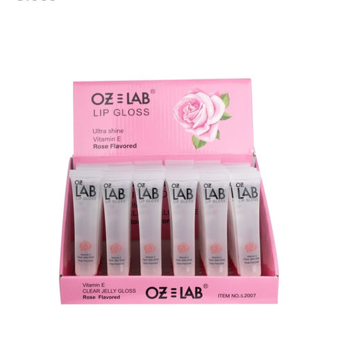 Romantic Beauty- L2007 : OZ Lab Rose Shade Lip Gloss 4DZ DESCRIPTION Romantic Beauty's rose-scented lip gloss delivers a clear, high-shine finish without compromising comfort! Hydrate your lips with a nourishing formula infused with Vitamin E while giving your lips a fuller appearance. If desired, apply over matte lipstick for a glossy finish. The best price and deal w/ Bonitawholesale.com !!!