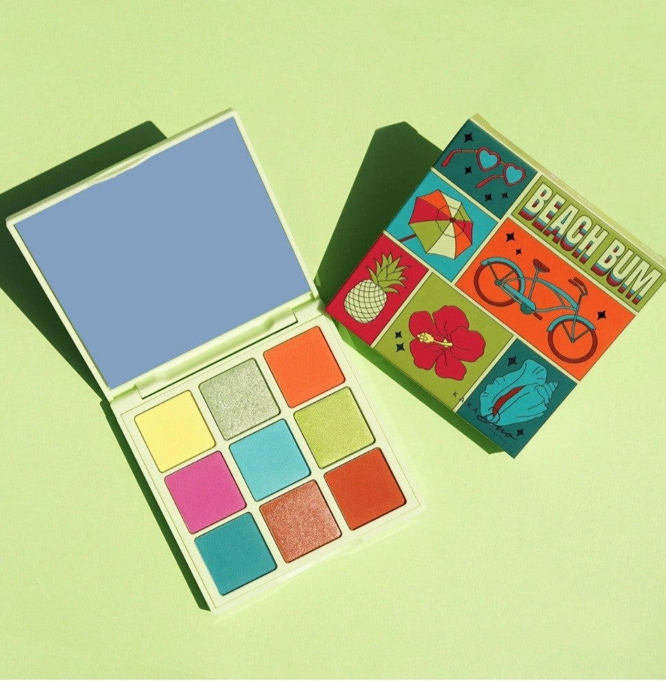 Kara- ES123 Beach Bum Shadow Palette : 6 PC *Qty.1=6 Palettes  DESCRIPTION Relatable? Yes! Life is a whole lotta mood and we know it. For every occasion, let a bad shadow day never be your problem. We got you! #Moodcollection  Beach Bum: Suntans and Summer breeze #bigmood! Beach Bum is retro Cali vibes all the way! Take a cruise down the boardwalk rocking its bold orange! Enjoy a refreshing piña colada with aqua on your eyes. Feeling that tan? Best match it up with a bit of 